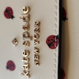 Kate Spade White and Red Crossbody Bag with Playful Ladybugs